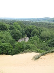 SX06785 Remains of Candleston Castle sticking out of trees seen from Merthyr-mawr Warren sand dunes.jpg